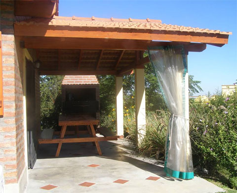 Galeria cubierta con parrilla